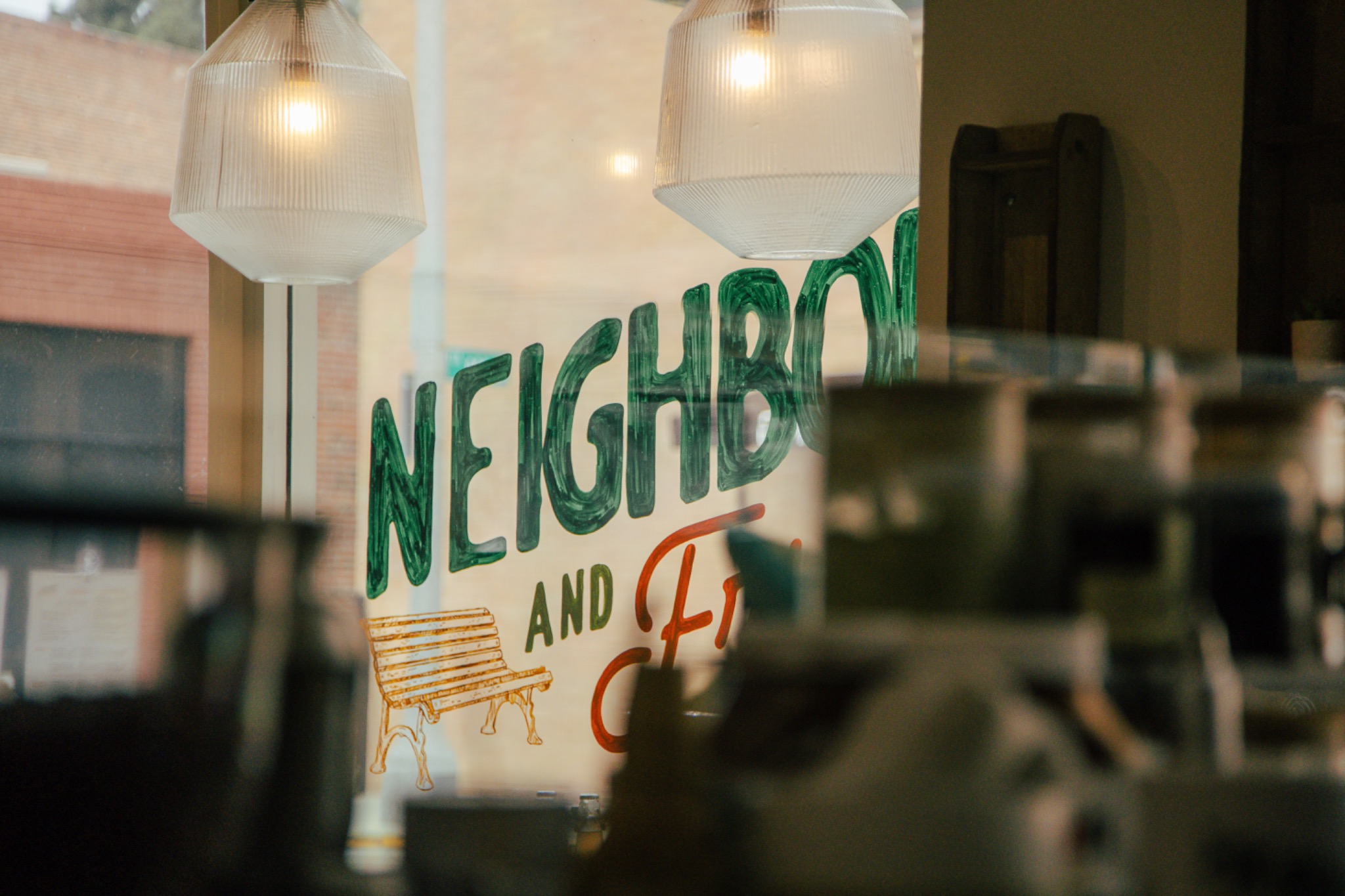 Neighbors & Friends café window, where neighbors gather and community work begins